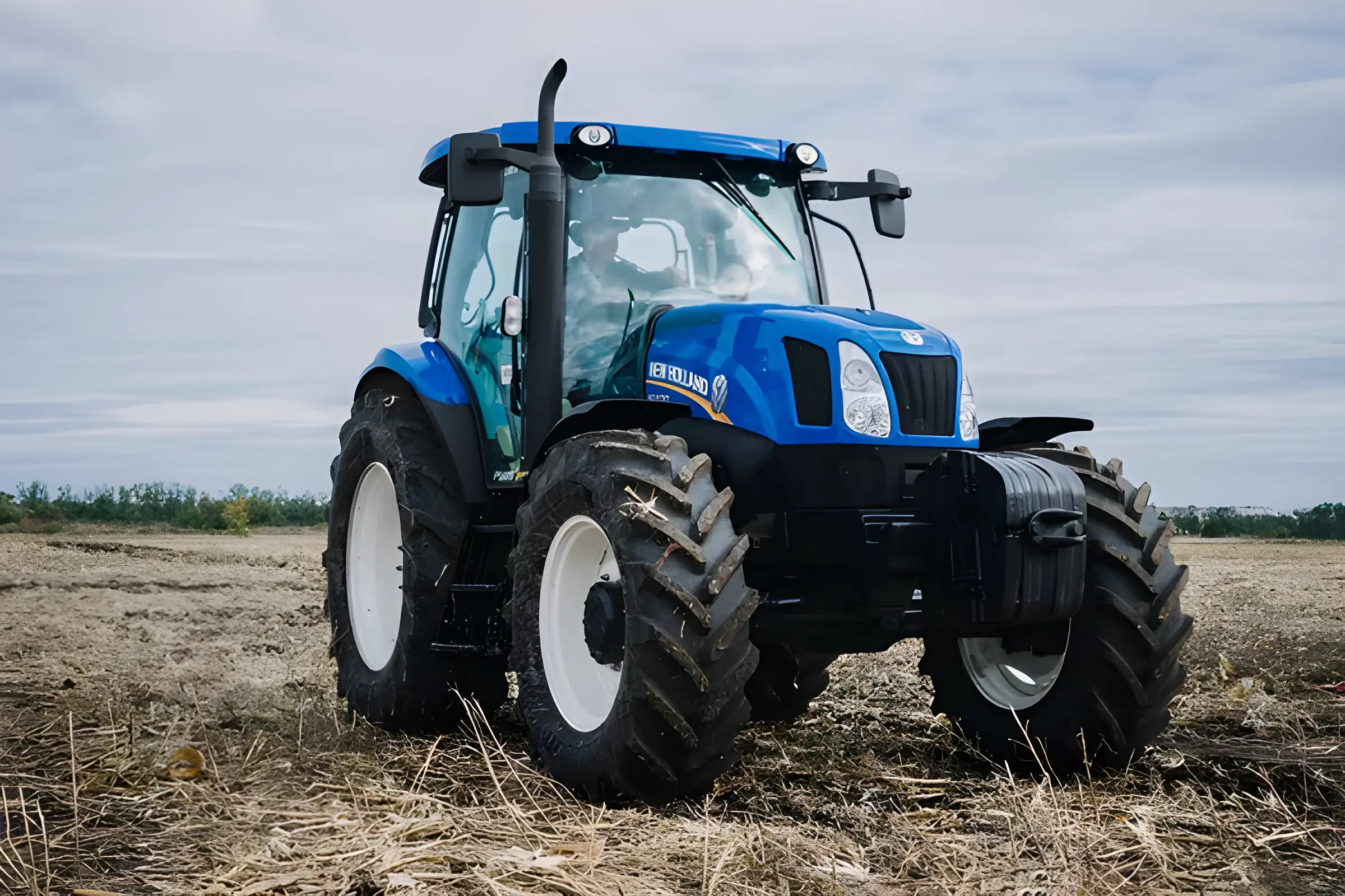 depositphotos_329538772-stock-photo-new-blue-tractor-holland-in